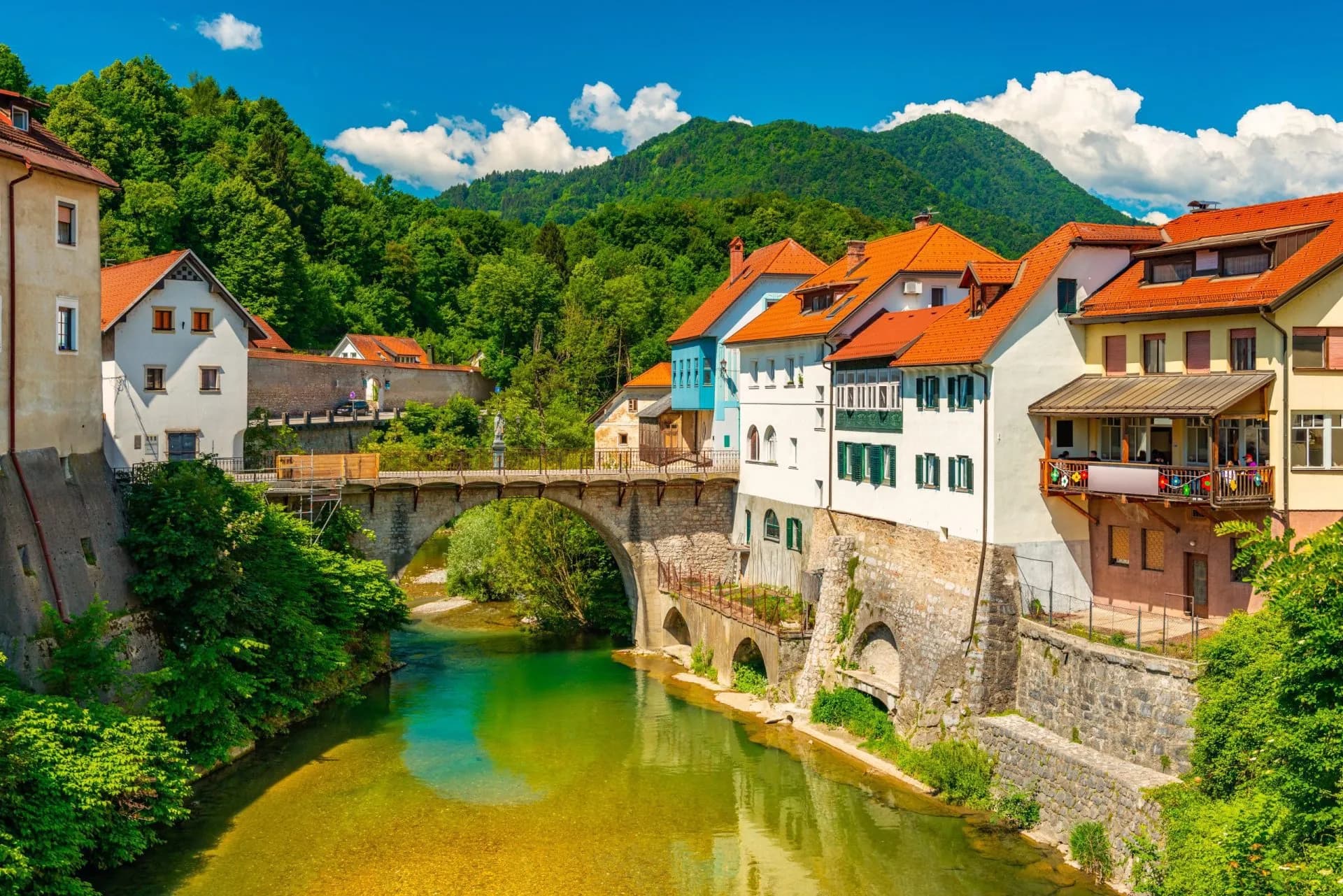 Cityscape of Škofja Loka, Slovenia, with Capuchin Bridge over the Selška Sora River.