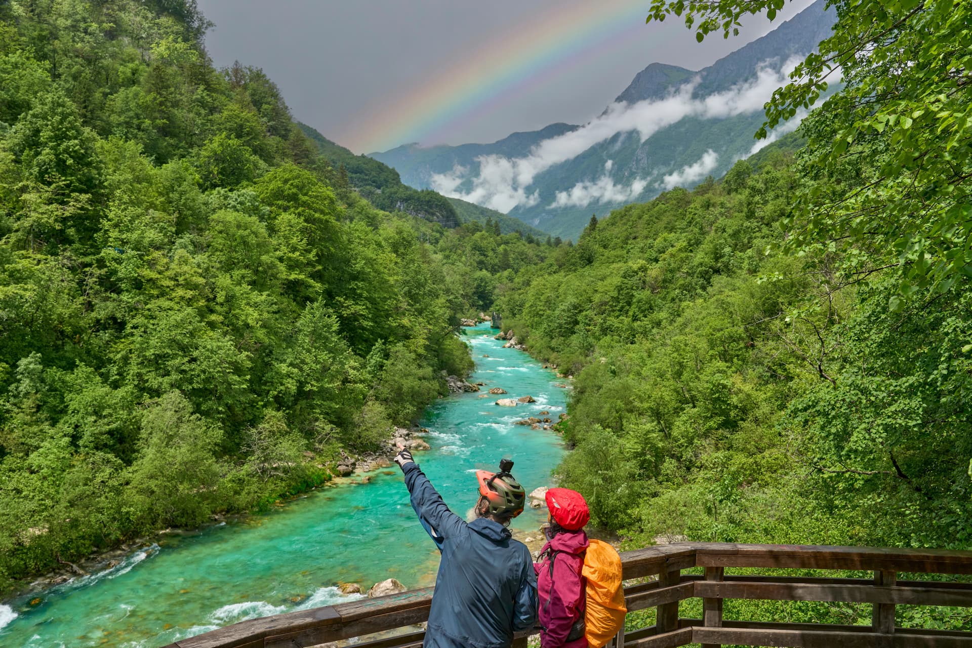 active senior couple on a e-bike tour in the Valley of River Soca, Triglav National Park near Bovec, Slovenia
