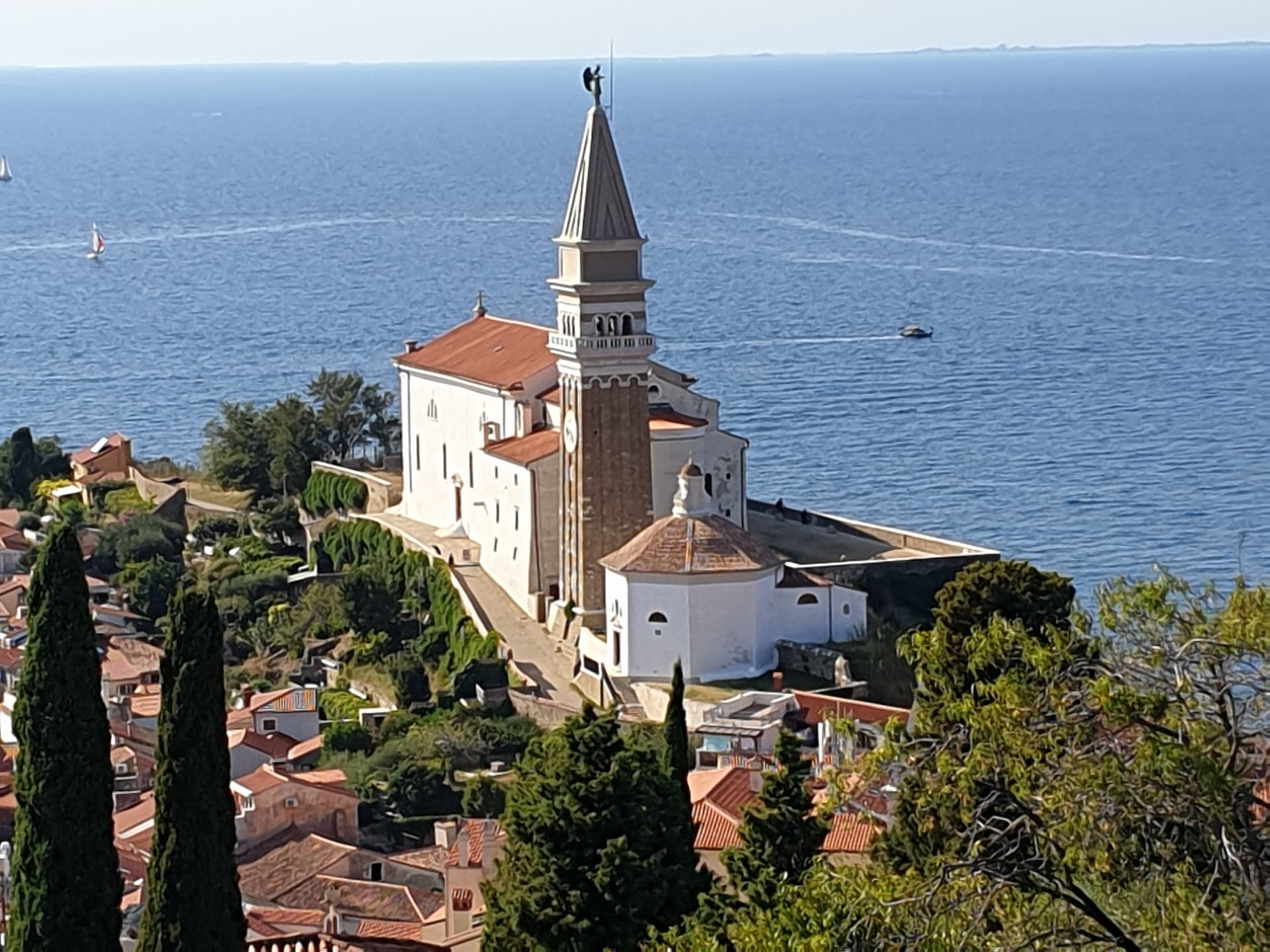 Piran church and bell tower overlooking the sea